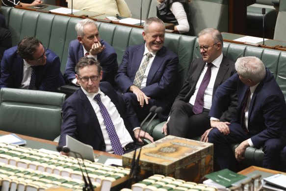 Bill Shorten, centre, shares a laugh with colleagues Matt Keogh, Andrew Giles, Stephen Jones, Anthony Albanese and Brendan O’Connor.