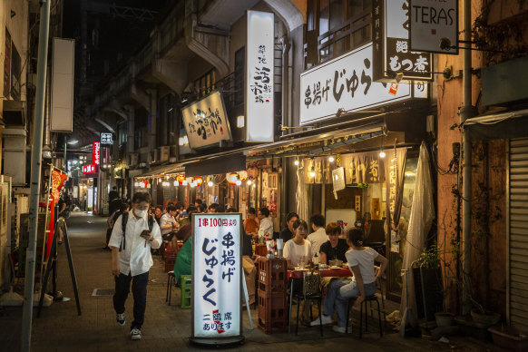 People enjoy drinks and foods at Japanese bar in Ueno area in Tokyo, Japan. But it’s not enough for the industry. 