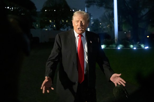 US President Donald Trump returning to the White House on Sunday night after a weekend at his Florida club.