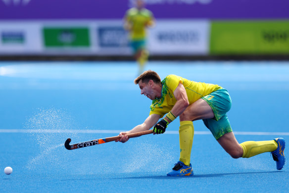 Edward Ockenden shoots during the men’s hockey gold-medal match against India. 