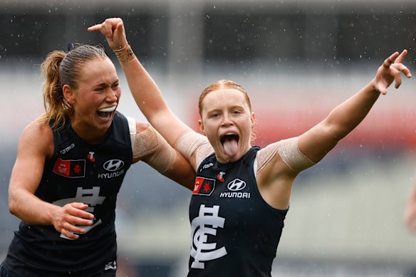 Keeley Sherar (left) and Sophie McKay of the Blues celebrate a goal.