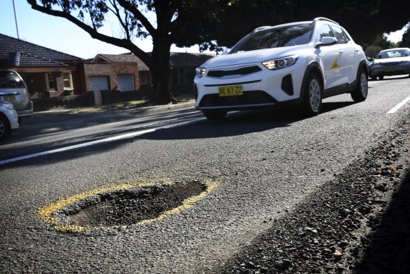 Pot luck: the deluge has brought potholes. 