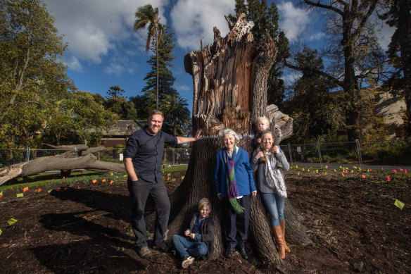 Anthony Morris (left) and Mel O'Reilly (right) with their kids Harvey and Darcy, and Ms O'Reilly's nan Nancy Brown, join extended family every year for an Easter Sunday picnic by the tree on the oak lawn.