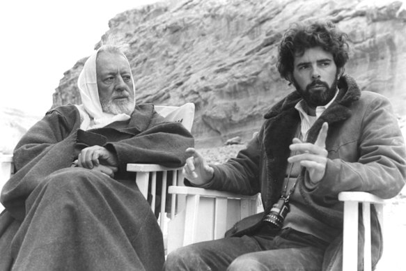 Alec Guinness with director George Lucas on set. Some of the scenes in Star Wars were filmed in Death Valley.