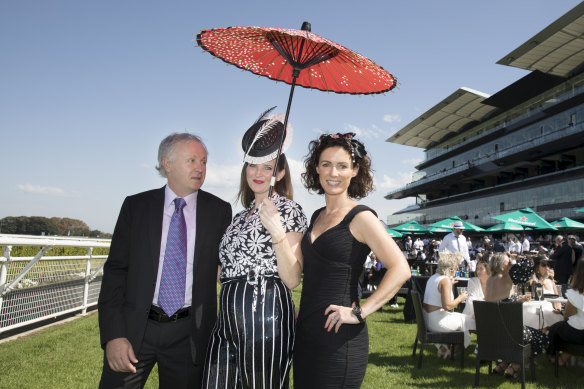 Glenn Burge (left) with journalists Rowena Galvin and Tansy Harcourt at Randwick Racecourse in 2019.