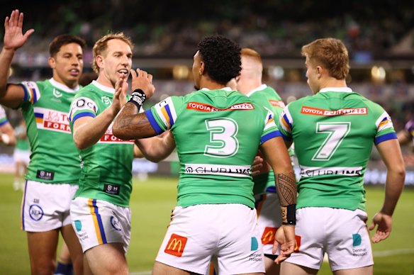 Simi Sasagi celebrates a try with his Raiders teammates.