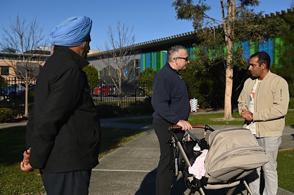 Sanjeet Hooda (right) thanks Rob Duggan for stepping in and saving his father’s life. 