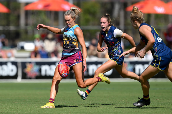 The Lions’ Orla O’Dwyer speeds away against the Crows.