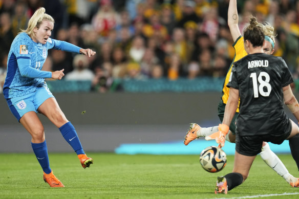 England’s Lauren Hemp scores their second goal.