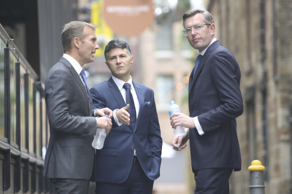 The Premier's senior ministers are backing: Rob Stokes (left), Victor Dominello and Treasurer Dominic Perrottet. 