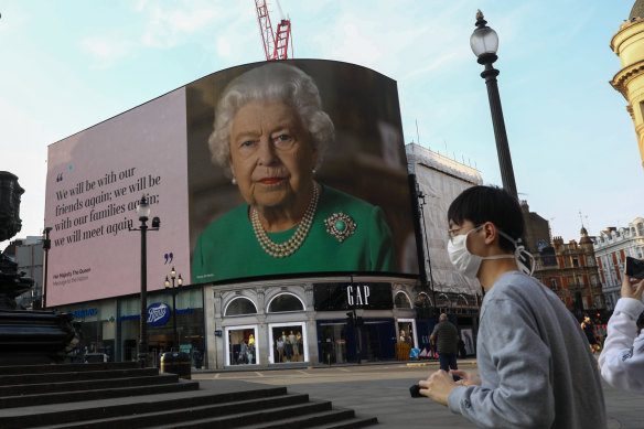 A message of support from the Queen in London's Piccadilly Circus. Many Britons stand accused of not taking COVID-19 restrictions seriously.