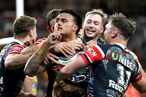 Spencer Leniu sends a message to the Brisbane crowd on Saturday night.