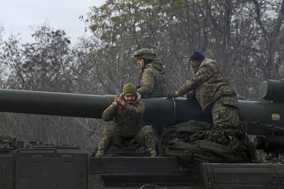 Ukrainian armed forces soldiers on a Pion self-propelled artillery system in the Donetsk Oblast, Ukraine, in November.