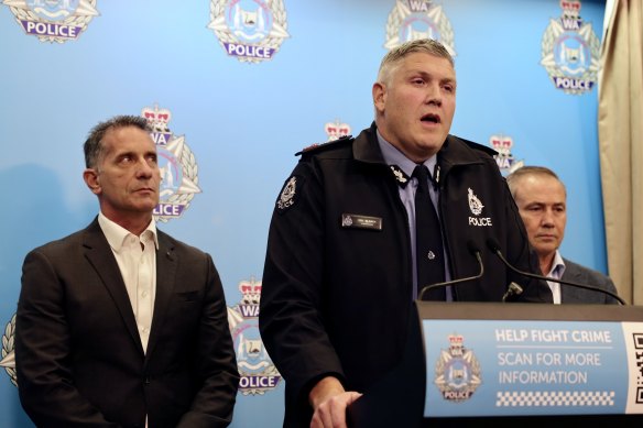 WA Police Commissioner Col Blanch flanked by Police Minister Paul Papalia and WA Premier Roger Cook during a press conference on Sunday.