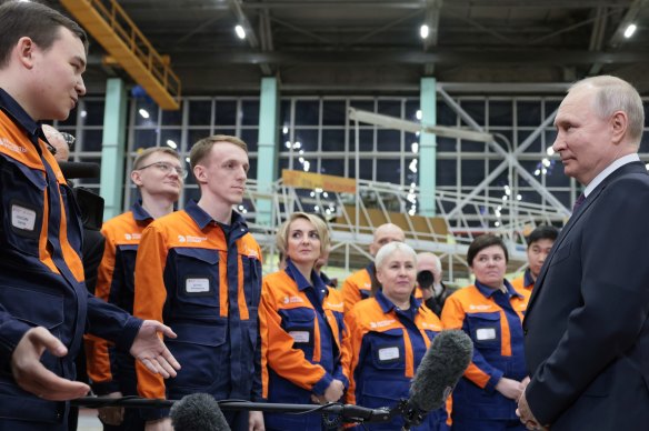 Russian President Vladimir Putin visits a helicopter manufacturing company in east Russia in March.