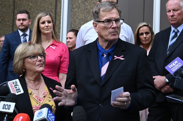 Greg Simms, brother of Lynette Dawson, and his wife, Merilyn, address the media after Chris Dawson was sentenced on Friday.