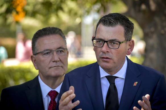 Victorian Premier Daniel Andrews, flanked by Labor MP John Eren. 