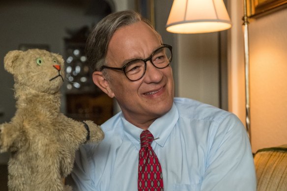 Watch that smile. Tom Hanks as the jovial Fred Rogers. 