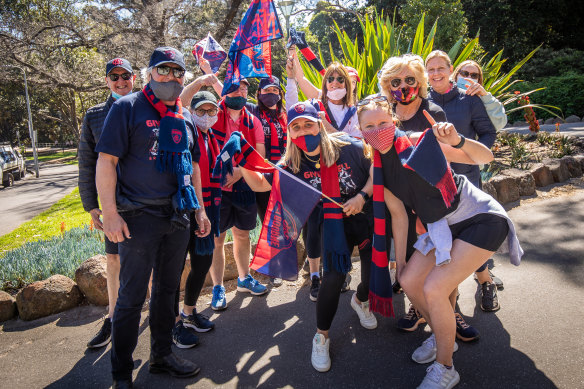 Demons fans out celebrating in South Yarra.
