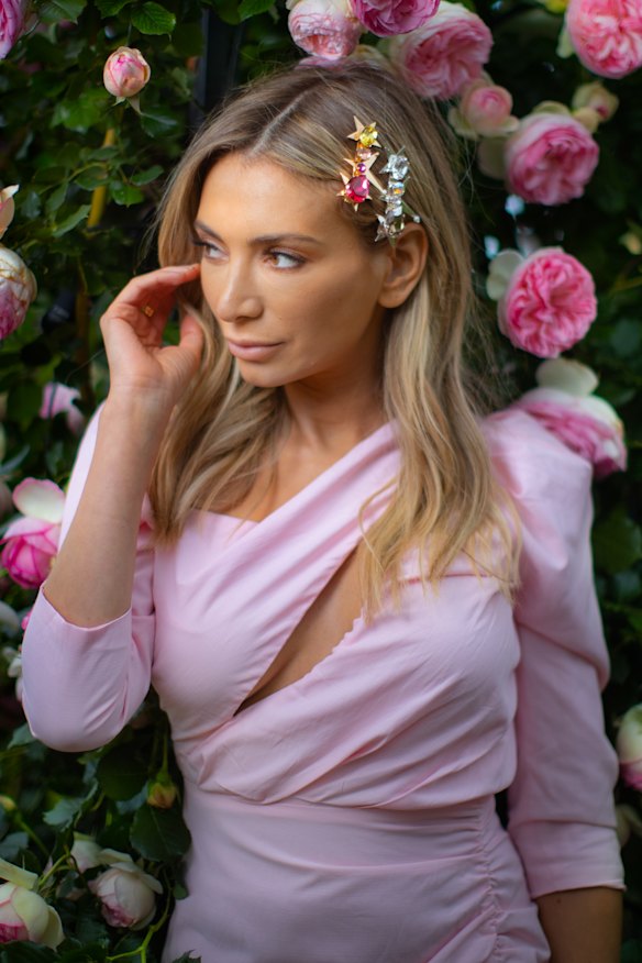 Victoria Racing Club ambassador Nadia Bartel swaps a hat for embellished hair clips. 