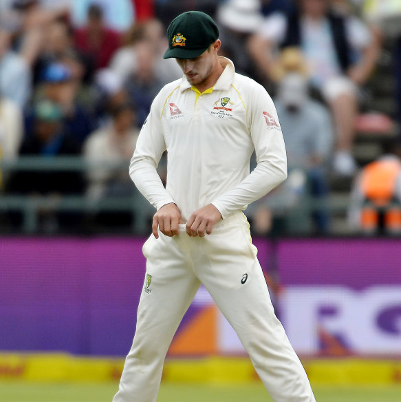 Bancroft attempting to hide the sandpaper he was using.