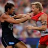 Ollie Florent and Isaac Heeney go toe-to-toe