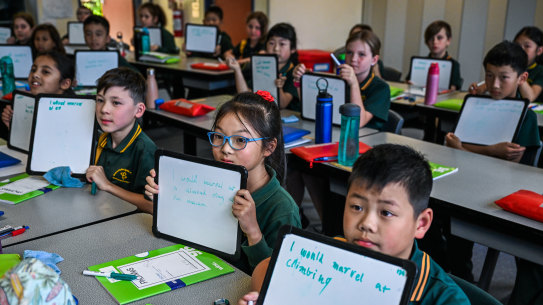 Students at Brandon Park Primary School in Wheelers Hill practice their spelling.
