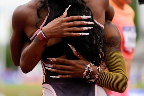Gabby Thomas gets a hug from Sha’Carri Richardson after winning the women’s 200-metre final during the U.S. Track and Field Olympic Team Trials Saturday, June 29, 2024, in the USA. 