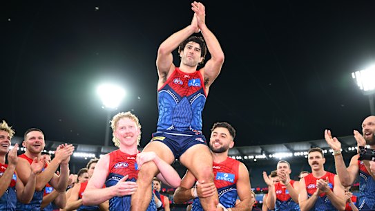 Christian Petracca is chaired off after a victory in his 200th AFL game earlier this year.