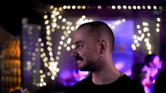 Viacheslav Drofa, known as Otoy, smiles during a concert to raise funds for soldiers fighting for Ukraine in Kyiv, Ukraine, on June 5.