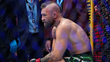 Conor McGregor reacts after his loss to Max Holloway.