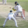 dia’s Rishabh Pant is surrounded by fieldsmen as he bats during play on the final day of the fourth cricket test between India and Australia at the Gabba, Brisbane, Australia, Tuesday, Jan. 19, 2021. (AP Photo/Tertius Pickard)