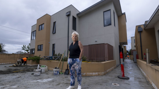 Kerry Ould outside the Frankston South apartment she purchased with flammable cladding and other defects.