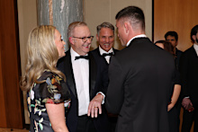 In the depths of a Canberra winter, nothing warms the soul like the chance to dress up fancy and let your hair down.
That's just what the Midwinter Ball is for, a chance for politicians and media figures to flock to Parliament House to celebrate, rather than confront each other.
Jodie Haydon, Prime Minister Anthony Albanese, Deputy Prime Minister and Minister for Defence Richard Marles and Sam Marles were all smiles as they walked in.