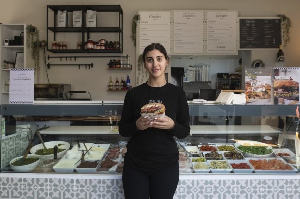 Owner Lena Raslan with the Lorenzo sandwich at Delisia.