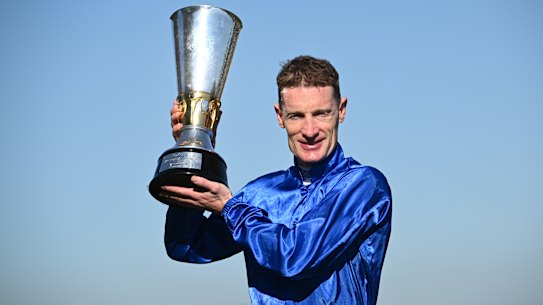 Mark Zahra with the Victoria Derby trophy.