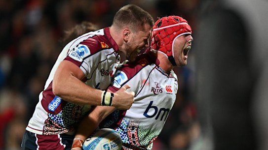 Harry Wilson celebrates after scoring a try in the Reds’ win over the Crusaders.