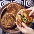 Filled flatbreads with kale and potato masala.