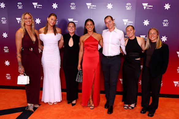 From left: Tayla Harris, Georgia Campbell, Maeve Chaplin, Kate Hore, Eden Zanker, Olivia Purcell and Tyla Hanks of the Demons.