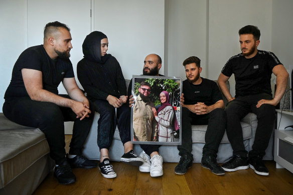 L to R) Hussein Saab, Kawthar Roumie, Ali Saab, Sam & Yousef the close friends of Ibrahim ‘Bob’ Bazzi who was killed along with his wife and brother in an Israeli strike on the family home in the southern Lebanese  town of Bint Jbei