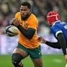 Australia’s Filipo Daugunu, left, is challenged by France’s Louis Bielle-Biarrey during the rugby union Nations Series match between France and Australia in Saint-Denis, outside Paris, Saturday, Nov. 22, 2025. (AP Photo/Christophe Ena)