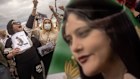 People hold signs and chant slogans during a protest against the death of Iranian Mahsa Amini and the government of Iran in Istanbul, Turkey.