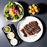 Mains, such as inside skirt steak, come with a salad, Colombian-style sauces – one a lemony sour cream, the other a zesty tomato – and a choice of fries, rice, plantain fritters, cassava chips or golden potatoes (pictured).