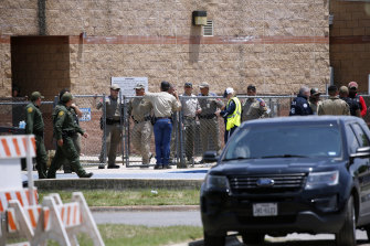 Law enforcement, and other first responders, gather outside Robb Elementary School after the attack.