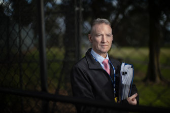 Detective Sergeant Dean Hayes in the park near where Li Bing Di was last seen.