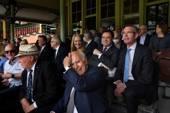 Cricket commentator Jim Maxwell (2nd from left), former Australian prime minister John Howard (3rd from left) and NSW Premier Dominic Perrottet (behind Howard) during the memorial service of Alan Davidson.