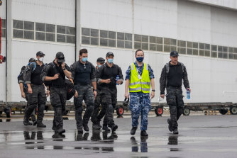Australian Federal Police Special Operations members left Canberra for the Solomon Islands on Friday morning.
