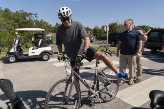 Joe Biden gets back on his bike after fall.
