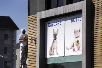 A picture of a French bulldog is featured above the entrance of Dog-E-Den Hollywood, near where Lady Gaga’s dog walker was shot.