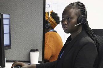 A support worker handles a call. 